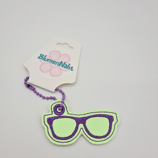 Kleiner Anhänger Brille #3 neon-gelbgrün/lila